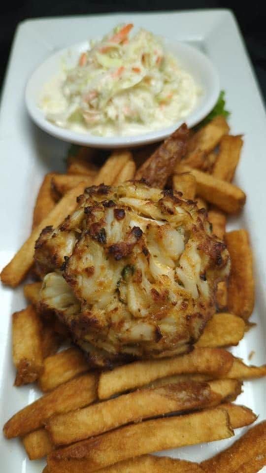 our jumbo lump crab cake over hand-cut fries